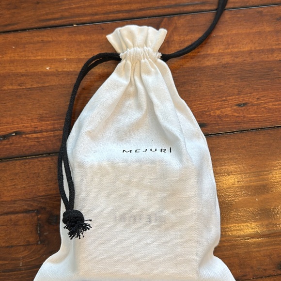 Mejuri: Cartilage Diamond Mini Hoop - Picture 3 of 5